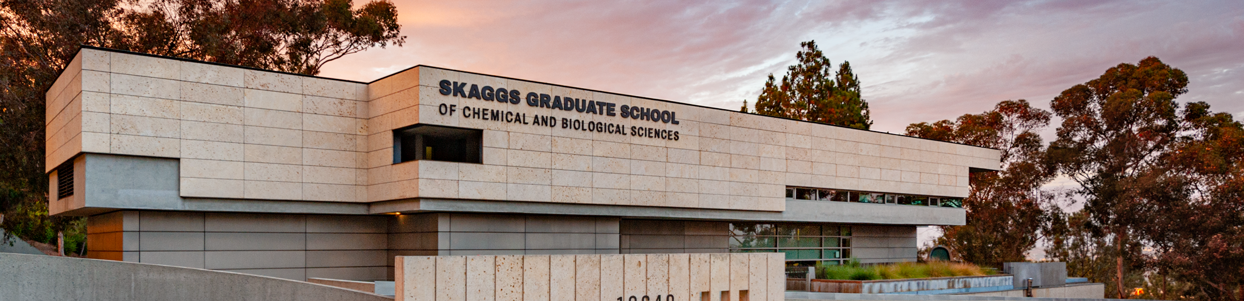 Skaggs Graduate School building in sunset background